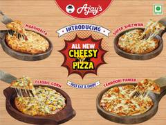
      
      Ajay's launches new range of cheesy pizzas, New Year gift
      
      