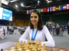 
      
      Iranian woman chess player warned not to return home 
      
      