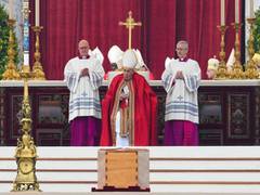 
      
      Pope Francis pays tribute to Pope Benedict at his funeral
      
      