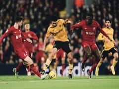 
      
      Liverpool escape defeat in thrilling 2-2 draw with Wolves
      
      