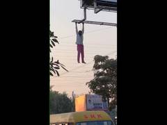 
      
      Telangana: Drunk man climbs a bilboard frame in Siddipet, booked
      
      