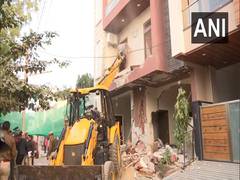 
      
      Rajasthan paper leak case: JDA removes illegal portions of...
      
      