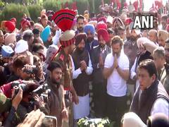 
      
      Rahul Gandhi pays last respects to Santokh Singh
      
      