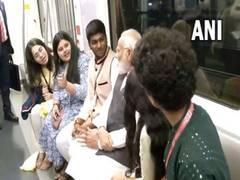 
      
      PM takes ride in Mumbai metro; interacts with students, workers
      
      