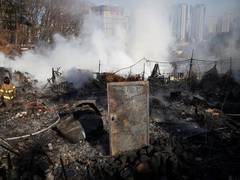 
      
      Massive blaze erupts in one of Seoul's last slums
      
      