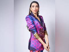 
      
      This picture of Karisma Kapoor will take you back to her 90s
      
      