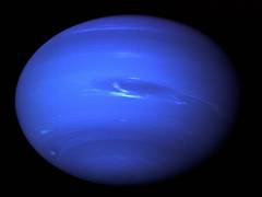 
      
      Tumultuous migration on the edge of the hot Neptune desert
      
      