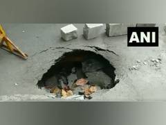 
      
      Road caves in Bengaluru, no casualty reported
      
      