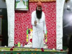 
      
      Dera chief Ram Rahim cuts cake with sword, video gone viral 
      
      