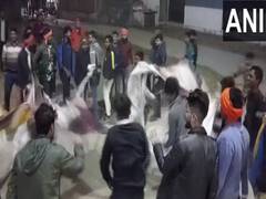 
      
      Police register case against protestors, tearing Pathaan posters
      
      