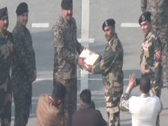 
      
      BSF exchanges sweets with Pak Rangers at Attari-Wagah border 
      
      
