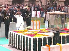 
      
      President Murmu, PM Modi pay tributes at Raj Ghat on Martyrs' Day
      
      