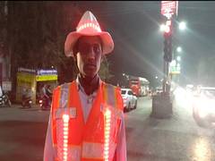 
      
      Durg police's jacket that illuminates in sync with traffic signal
      
      