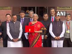 
      
      FM Sitharaman dons temple border red saree for Budget 2023
      
      