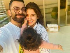 
      
      Anushka Sharma shares playful picture of Virat, Vamika
      
      