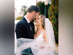 
      
      Reality show star Clare Crawley marries Ryan Dawkins
      
      