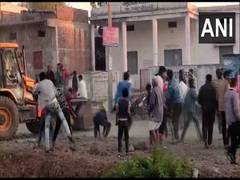
      
      Locals pelt stones at bulldozer during anti-encroachment drive
      
      
