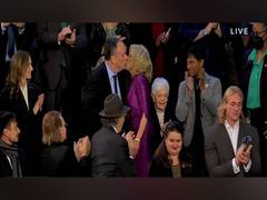 
      
      US First lady Jill Biden kisses Kamala Harris' husband
      
      