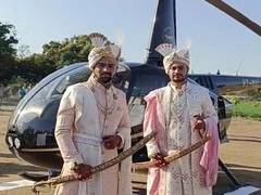 
      
      MP cousins take out wedding procession in helicopter
      
      