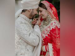 
      
      Shivaleeka, Abhishek exude charm in new wedding pictures
      
      