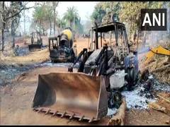 
      
      Vehicle, road construction machinery torched by Naxals
      
      