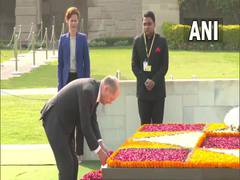 
      
      German Chancellor lays wreath at Mahatma Gandhi memorial in Delhi
      
      
