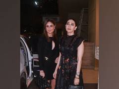 
      
      Kareena, Karisma make a statement in 'black' at b'day bash 
      
      