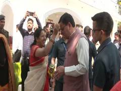 
      
      Uttarakhand CM celebrates Holi with locals at his home in Khatima
      
      