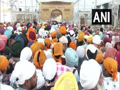 
      
      Devotees celebrate Hola Mohalla at Golden Temple Amritsar
      
      