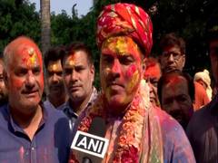 
      
      Delhi: BJP MP Parvesh Verma celebrates Holi at his residence
      
      