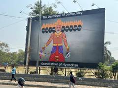 
      
      Posters in Hyderabad calling PM Modi a 