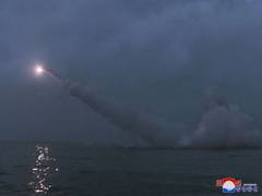 
      
      North Korea fires two 