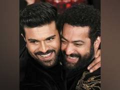 
      
      Ram Charan, Jr NTR share tight hug as 'RRR' picks up Oscar
      
      