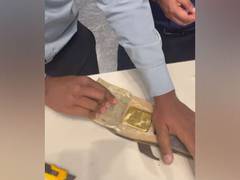 
      
      Passenger caught smuggling gold concealed in slippers
      
      