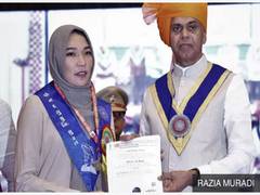 
      
      Afghan female student in India wins gold medal
      
      