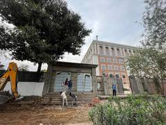 
      
      'Encroachment': PWD razes stairs of under-construction Cong HQ 
      
      