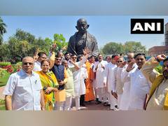 
      
      BJP's OBC MPs hold protest at Gandhi statue in Parliament
      
      
