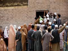 
      
      Queues show desperation of many as 'fight for food' continue
      
      