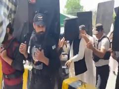 
      
      Imran Khan walks into court with bulletproof helmet, human shield
      
      