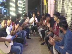 
      
      Hanuman Jayanti: Youths recite Hanuman Chalisa outside cafe
      
      