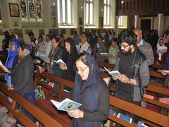 
      
      People across faiths gather at 200-year-old church on Good Friday
      
      