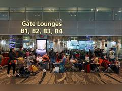 
      
      Singapore arrivals at two-thirds pre-COVID levels 
      
      