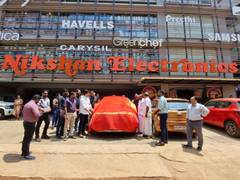 
      
      Nikshan Electronics and LG Home Appliances hand over car
      
      