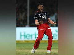 
      
      Vijaykumar Vyshak registers best bowling figures on debut for RCB
      
      