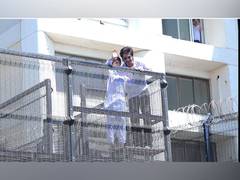 
      
      Shah Rukh Khan greets fans outside Mannat on Eid with Abram
      
      