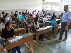 
      
      Invigilator takes photo of question paper during exam in Kurnool
      
      