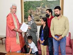 
      
      J-K: L-G hands over job letter to widow of slain Kashmiri Pandit
      
      