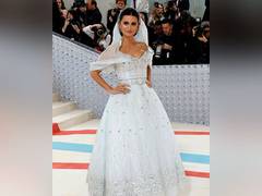 
      
      Penelope Cruz shines in wedding gown at Met Gala 2023
      
      