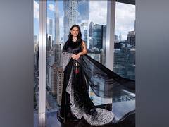 
      
      Isha Ambani makes Met Gala appearance in black saree gown
      
      