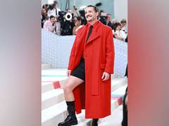 
      
      Met Gala: Pedro Pascal rocks red overcoat with black shorts look 
      
      